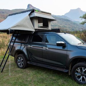 A truck with an awning on top of it.