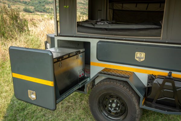 A close up of the door on an open truck