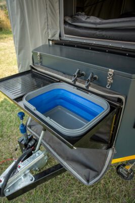 A sink in the back of an rv.