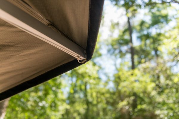 A close up of the awning on an outdoor patio.