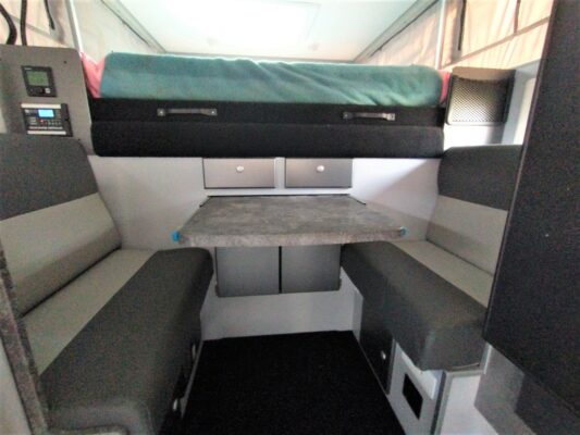 A view of the back of an rv.