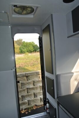 A view of the outside from inside a trailer.