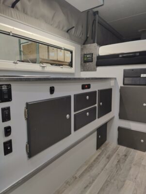 A room with many drawers and cabinets in it