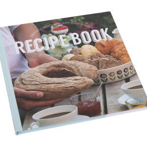 A Color Cookbook with a picture of bread and a cup of coffee.