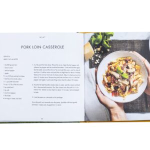 A Color Cookbook with a picture of a plate of food.