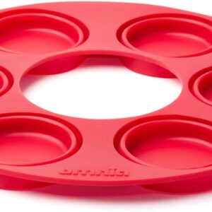 A red silicone Muffin Ring with six compartments.