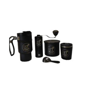 Black coffee brewing kit with grinder.