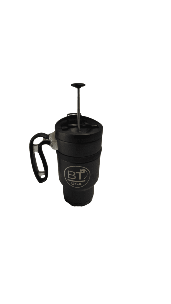 Black french press coffee maker with handle.