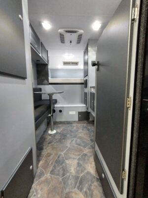 RV interior with modern gray design.